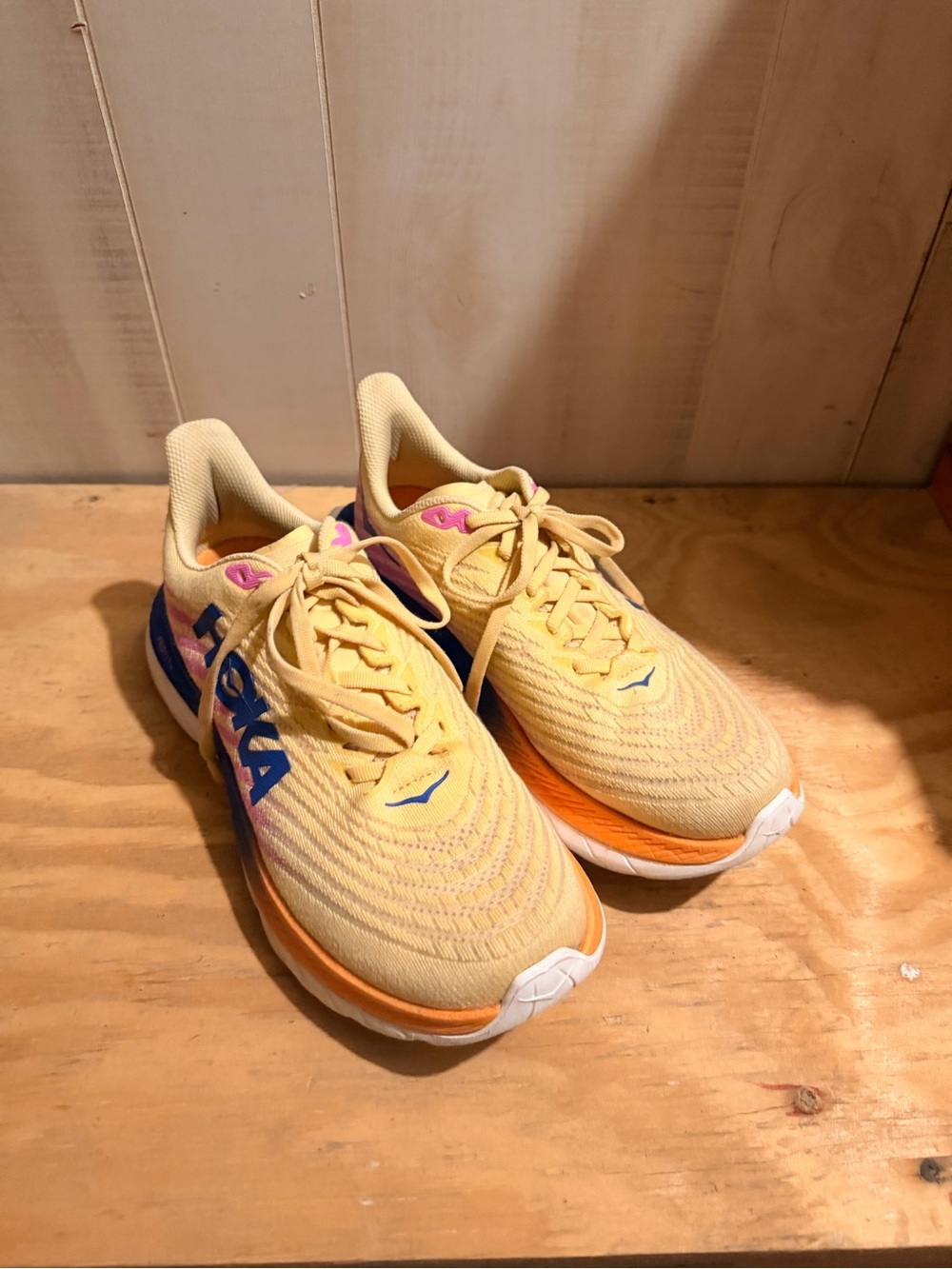 Hoka Kids Yellow Sneakers with Orange Midsole and Purple Logo